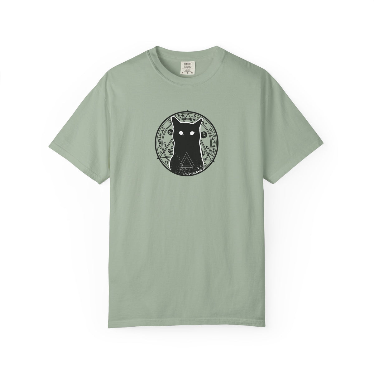 A sage green short-sleeve crewneck t-shirt featuring a black circular graphic of a cat with a triangle below it on the chest, displayed against a plain white background.