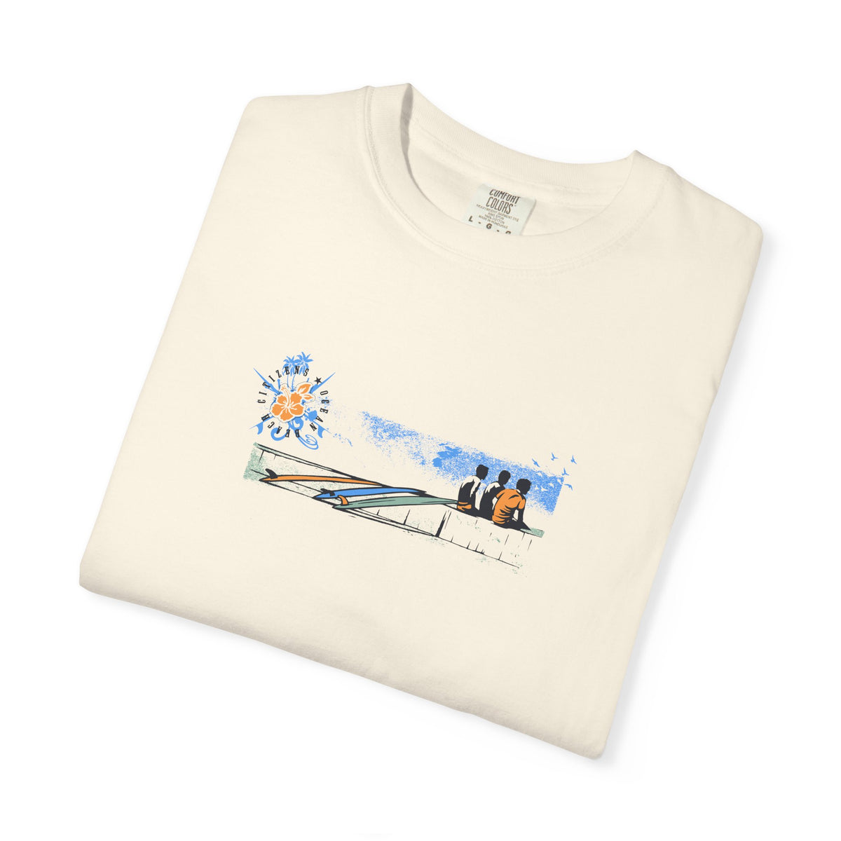 Folded cream surf scene graphic t-shirt